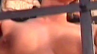 Sexy Brunette in Cage Has Extreme Threesome Sex with Two Big Hard Cocks