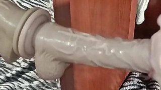 A Korean Woman Practices Blowjob in Front of a Mirror