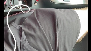 Young cute taxi uber grab driver catches passenger jerking while driving and gives helping hand.