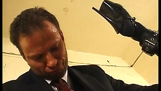 Tied up woman with clitoris piercings, sodomized by a stick