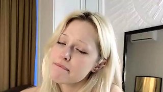 Close up with teen blonde sex doll rubbing her cunt