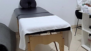 A MILF Gets Fingered by the Proctologist During an Anal Exam.