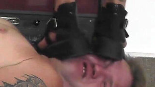 Mistress Cleo Stands on His Slave and Smokes