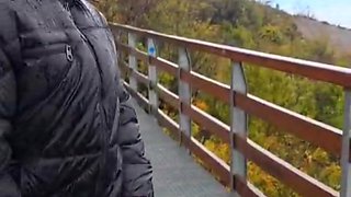 Slutty redhead gives a nice blowjob to an older guy outdoor and takes his cum in her mouth