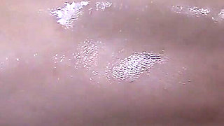 Naked Sportswoman Oils Herself up