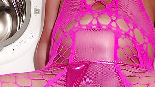 Flopping cock in pink fishnet
