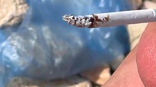 Smoking Cigarettes on the Beach