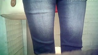 Redhead white amateur chick in the toilet room pissing on cam