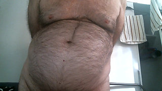 Coach Karl Shows off His Furry Belly