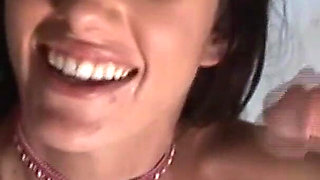 The beautiful and sexy brunette makes the cocks enjoy with her hands