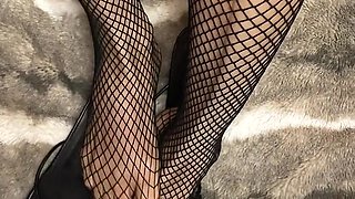 Fishnet in Open Toe Shoes with Red Nail Polish