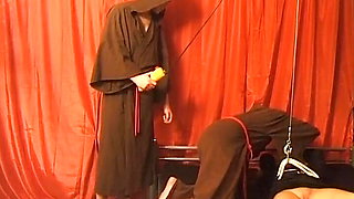 Suspended German nun tied and spanked by horny monk