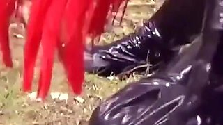Femdom Humiliation Outdoor: Latex Mistress and Rubber Submissive
