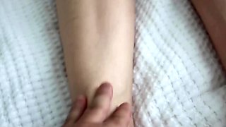 A horny stepson fucked his gorgeous stepmom in bed after a foot massage