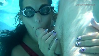 Lecherous babe Candy gives a blowjob underwater and gets fucked in the pool