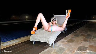 Laony having fun at night by the pool