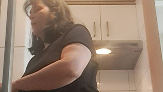mom cleaning the floor on all fours