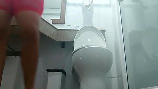 Camera Catches BBW Girl Peeing in Hotel Bathroom