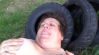 Fat woman gets fucked on the picnic table