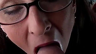 Sexy Granny Wearing Glasses Sucks and Drains a Fat Cock
