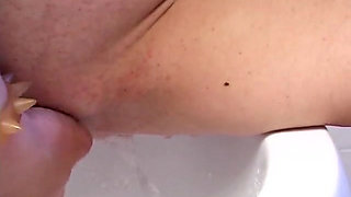 Pissing, anal masturbation in amateur lavatory video