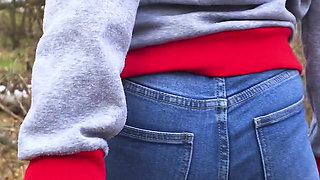 MILF In Blue Jeans Bends Over And Flashing Her Big Ass Outdoors