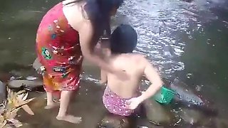 Beautiful girls having bath outdoor