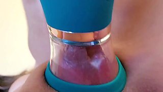 A nice juicy vagina is pleased with a special vacuum masturbator