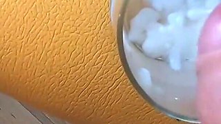 She drinks 11 loads of collected cum from a glass