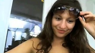 Brunette Flashes Webcam by the Pool