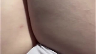 Cute girl pisses in a bottle and pours it back into her pussy