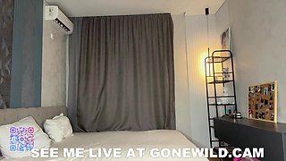 Cute Asian Babe in Pink Lingerie Webcam Tease