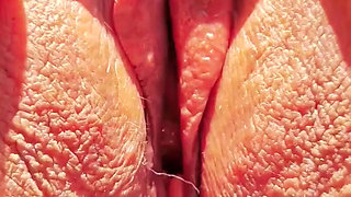 Horny mature shows super close up wide open cunt spread.