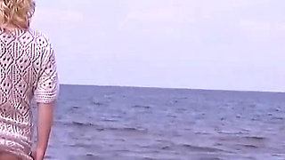 Nimble Mature Stepmommy Has Fun with Young Guys on the Beach 2