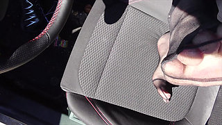 Feet of Nylonjunge in Pantyhose in Car