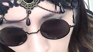Goth Mistress Sucks off a Lucky Fan