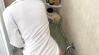 Taking Shower in T-shirt and High Heel Boots