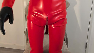 Putting on heavy rubber hazmat suit 1mm thick latex with gasmask