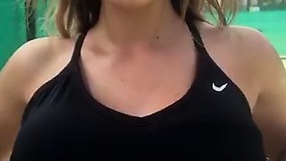 Blonde is flashing her big boobs in the outdoors