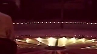 Blonde Stripper Bends Showing Shaved Pussy