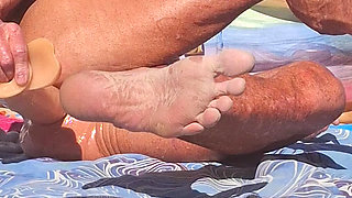 Key West oiled up using his new larger dildo at the beach
