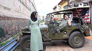 A horny soldier groped a petite woman in a hijab