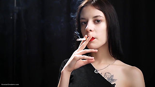 Slim Chick Is Smoking Two Reds
