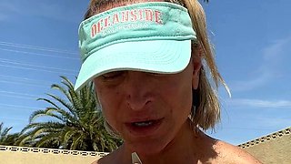 Blonde is flashing her big boobs in the outdoors