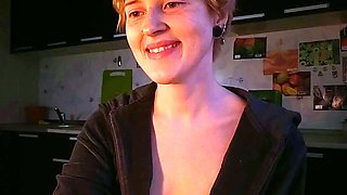 Blonde Teases Tits in Kitchen