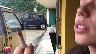 Outdoors smoking from the stunning brunette