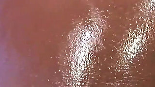 Horny ebony gets banged in her wet oiled pussy