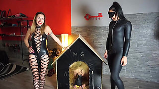Femdom Leather Queens Dominate Naked Slave in Heels