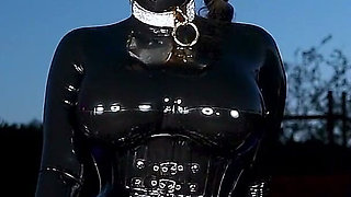 Rubber Doll Cock Teasing Rubber Bound Sub Outdoors
