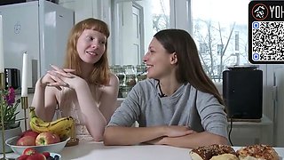 Redhead and dark haired lezzy play in kitchen with vagina